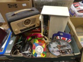 Box containing vintage radios, flat irons and rotary telephone