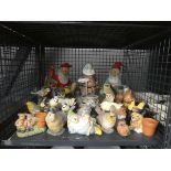 Cage containing plaster animal and gnome figures