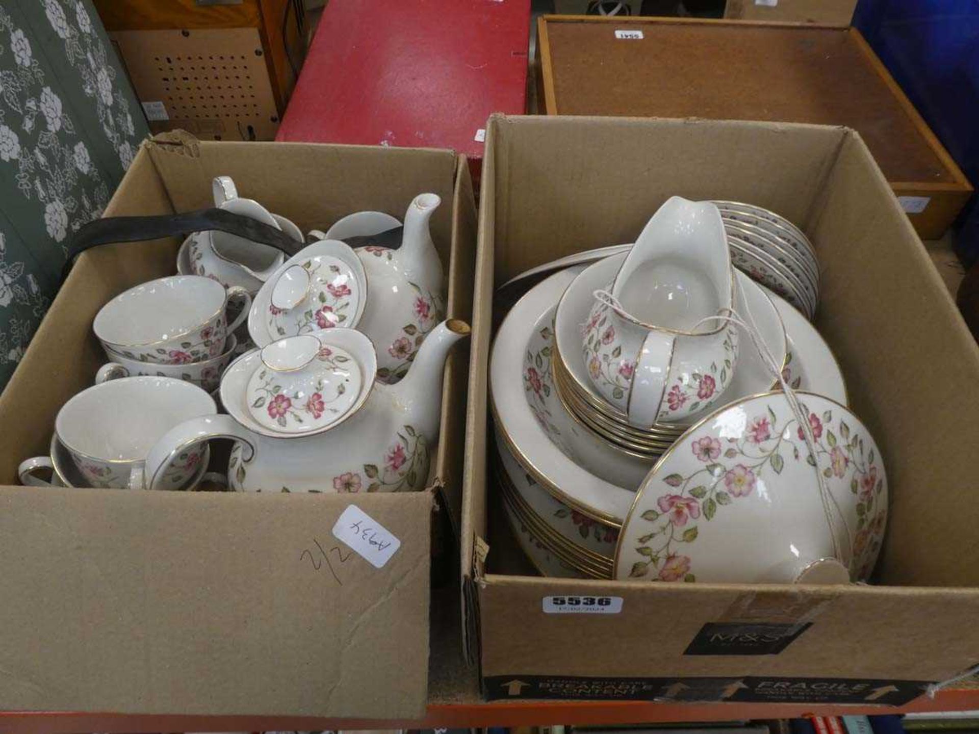 Two boxes containing Royal Doulton Woodland Rose patterned crockery