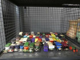 Cage containing die cast trucks and vans