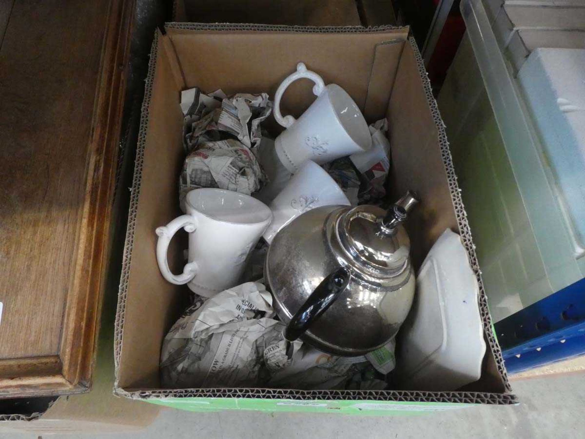 Box containing coffee mugs and silver plated teapot