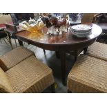 Edwardian wind out table plus six wicker chairs