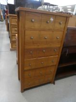 Narrow oak chest of six drawers