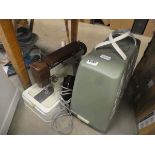Two cased electric sewing machines