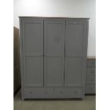 Grey painted triple wardrobe with 2 drawers under