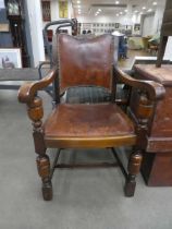Oak carver chair with leather seat and backrest
