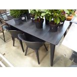 Plastic rectangular garden table with matching chairs