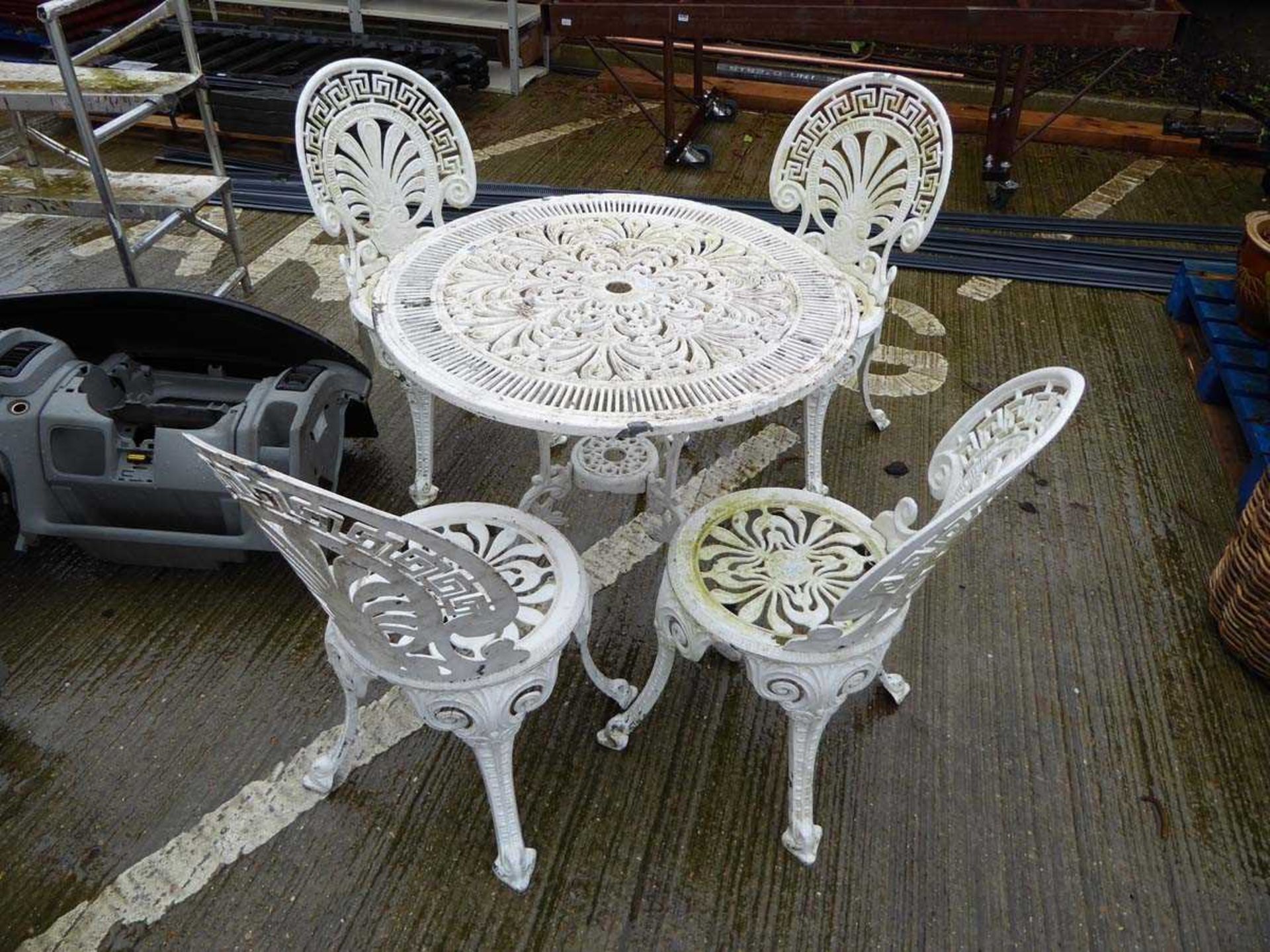 Metal garden table and 4 matching chairs
