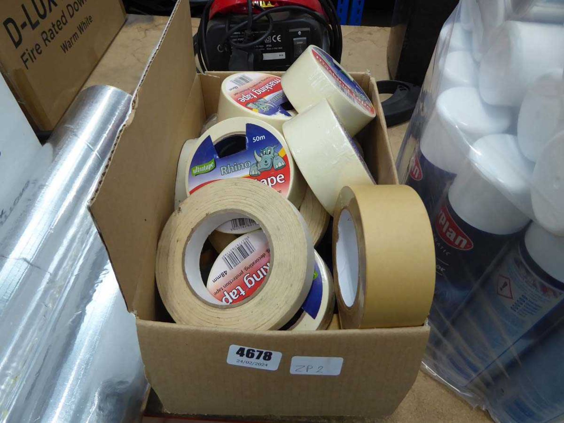 Box of masking tape, 2 rolls of silver film