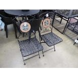 Two lattice fold-up metal garden chairs