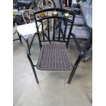 Two brown and black metal chairs