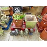 Pallet containing vintage stone sinks, two pots, and small quantity of animals