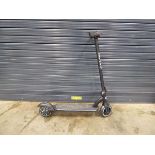 Small black Proto Hype electric scooter