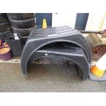 Two lorry wheel arches