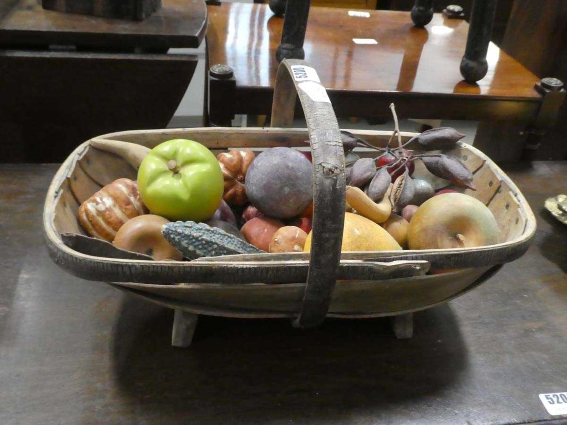 Basket with artificial fruit