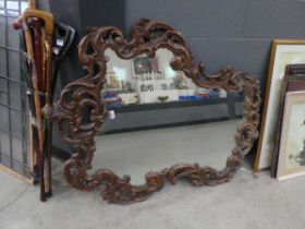 Large wall mirror with rococo style frame