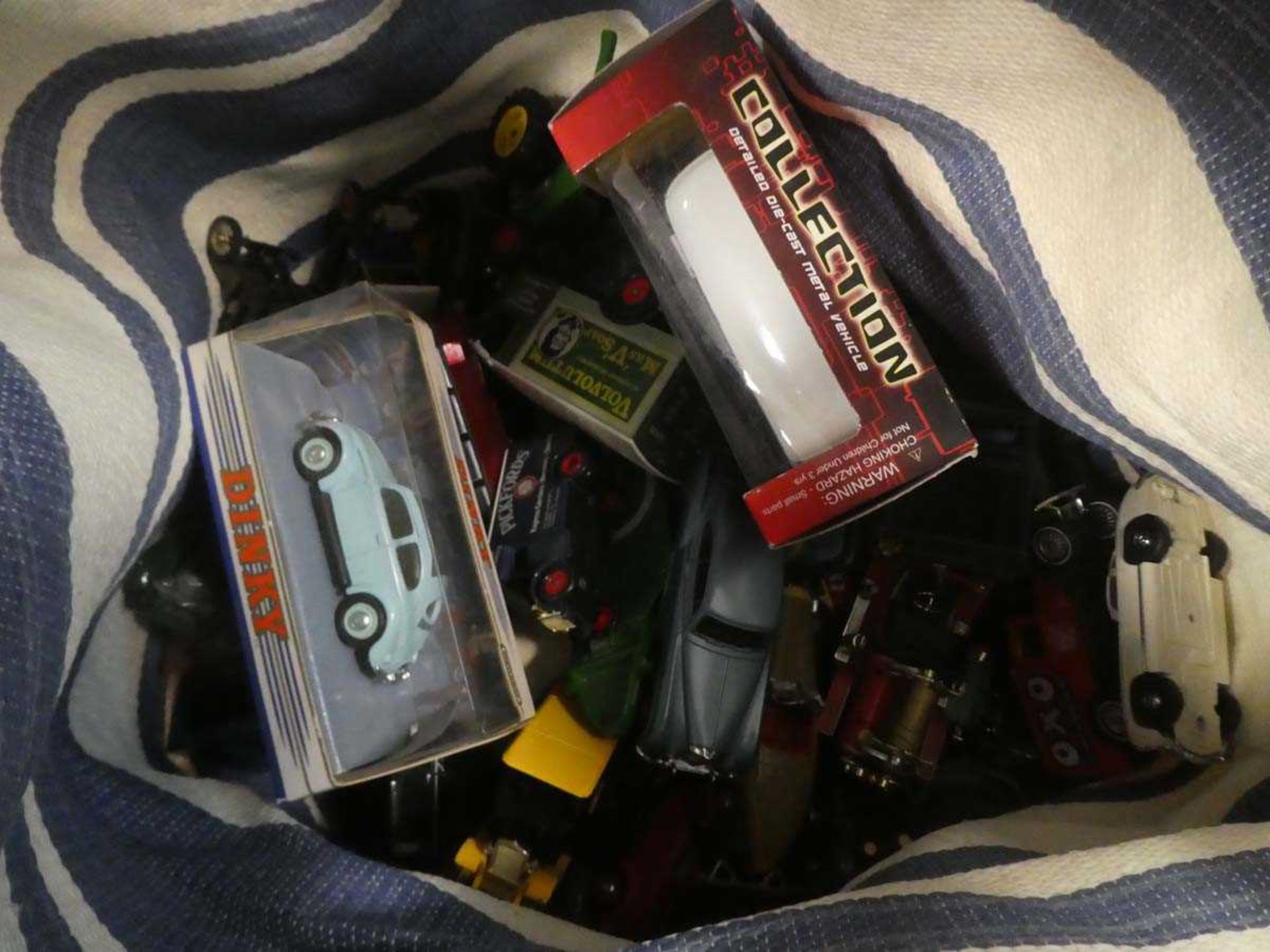 Bag containing qty of play worn and boxed Diecast toys