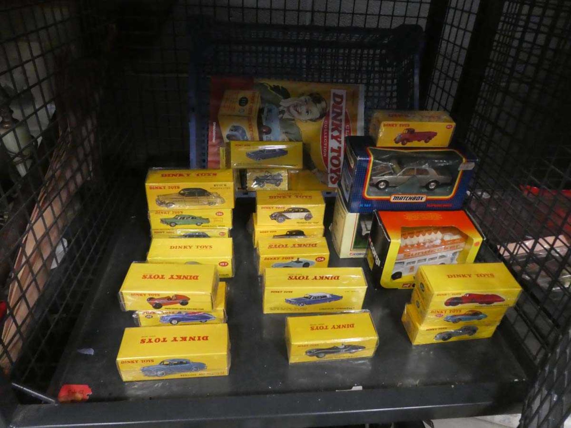 Cage containing matchbox and dinky cars