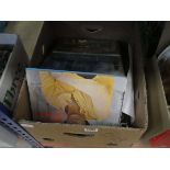 Box containing DVD's and vinyl records