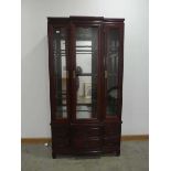 Oriental export redwood glazed display cabinet with drawers under