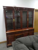 Oriental export glazed bookcase cabinet with carved panels depicting fruiting grape vines The pieces