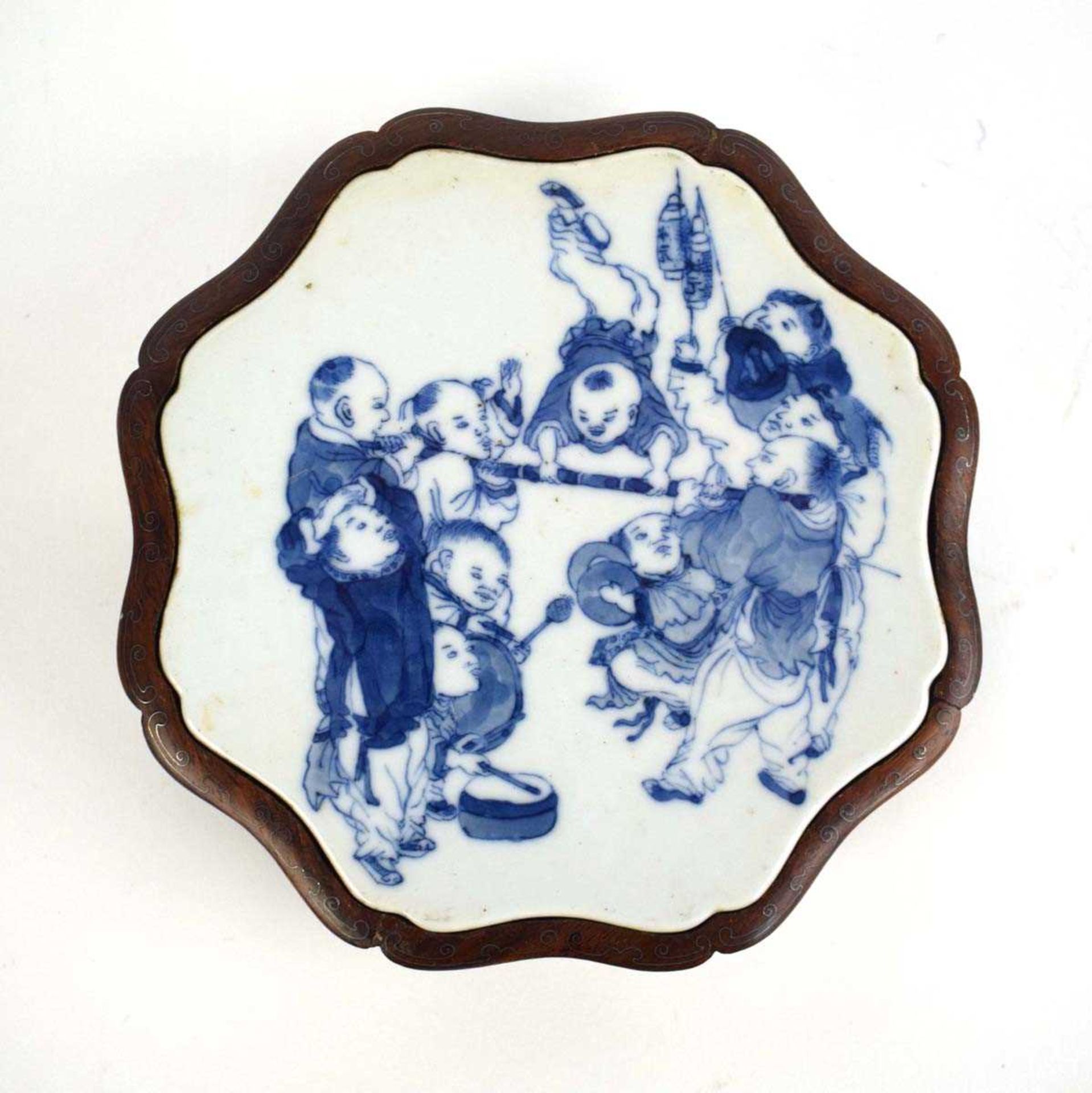 A Chinese blue and white plaque of flowerhead form decorated with children at play, set into a - Image 2 of 20