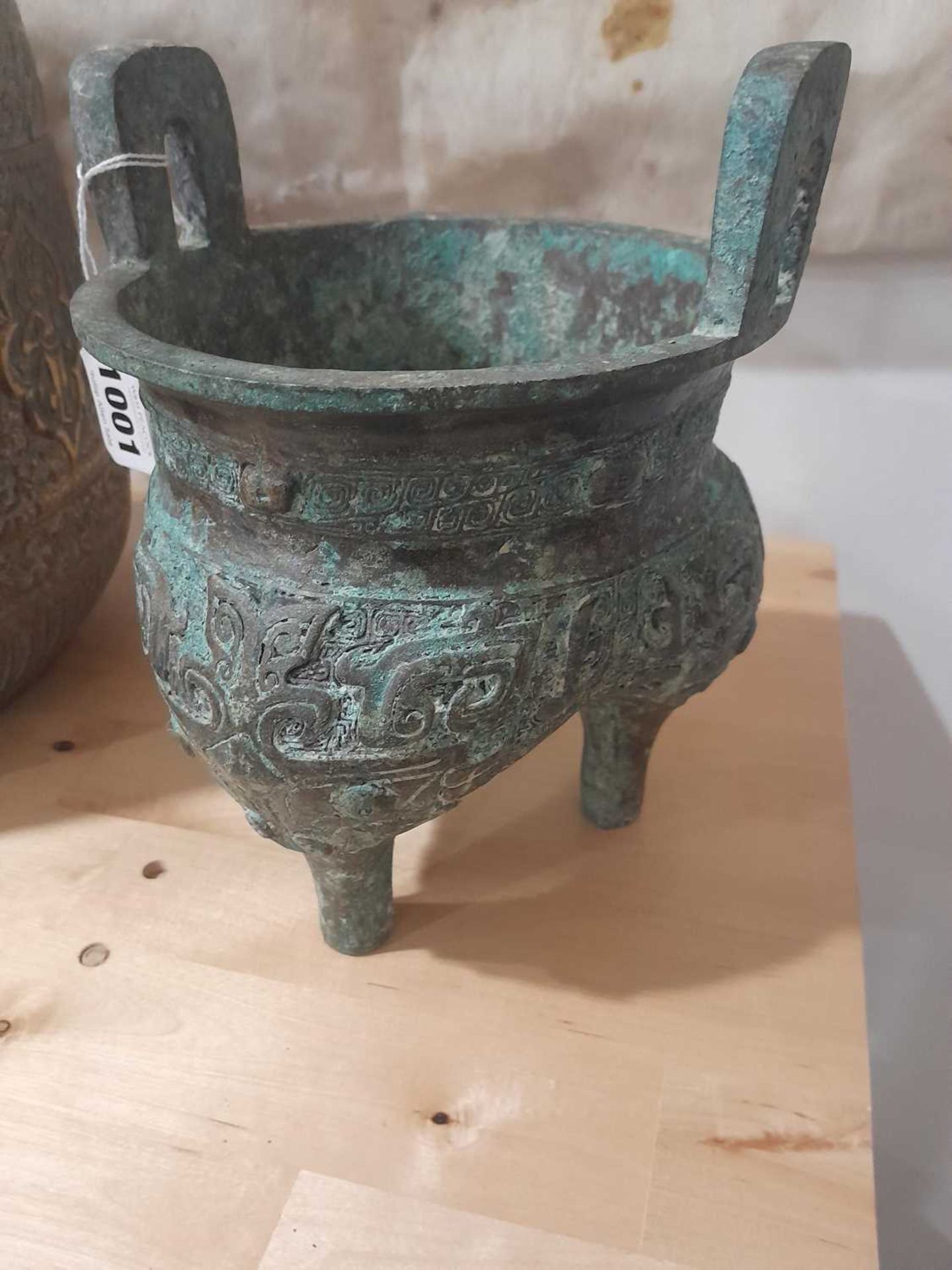 A Chinese green patinated bronze incense burner of archaic form, the triform base decorated with - Image 8 of 29