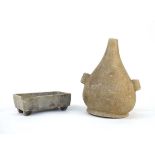 A Chinese carved soapstone vessel of slender ovoid form, h. 25.5 cm, a similar rectangular trough,