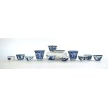 Twelve 18th century and later Chinese blue and tea bowls, cups etc., including a pair of cups