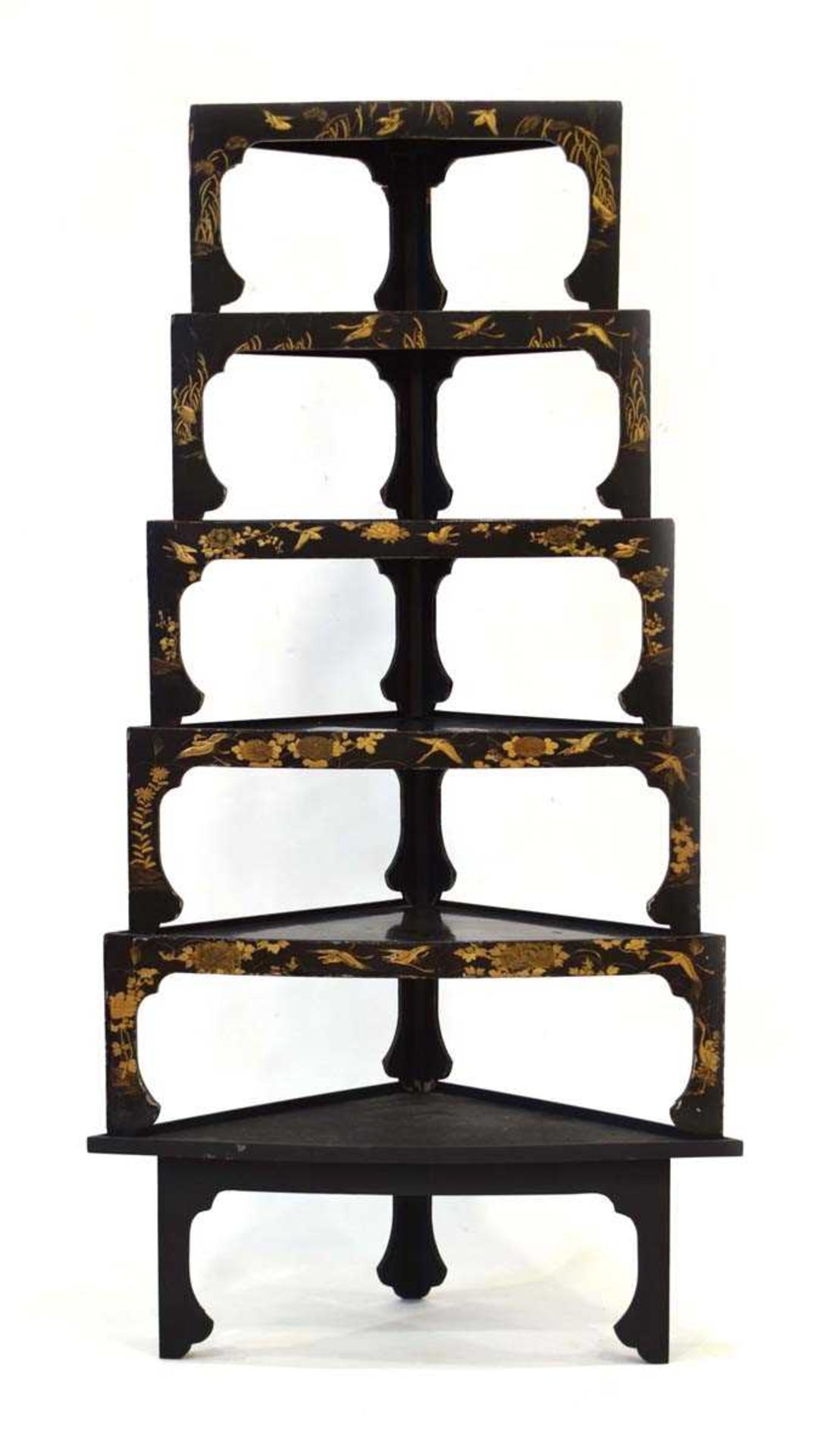 A nest of five Japanese black lacquered corner stands of slightly bowed form, each gilt decorated
