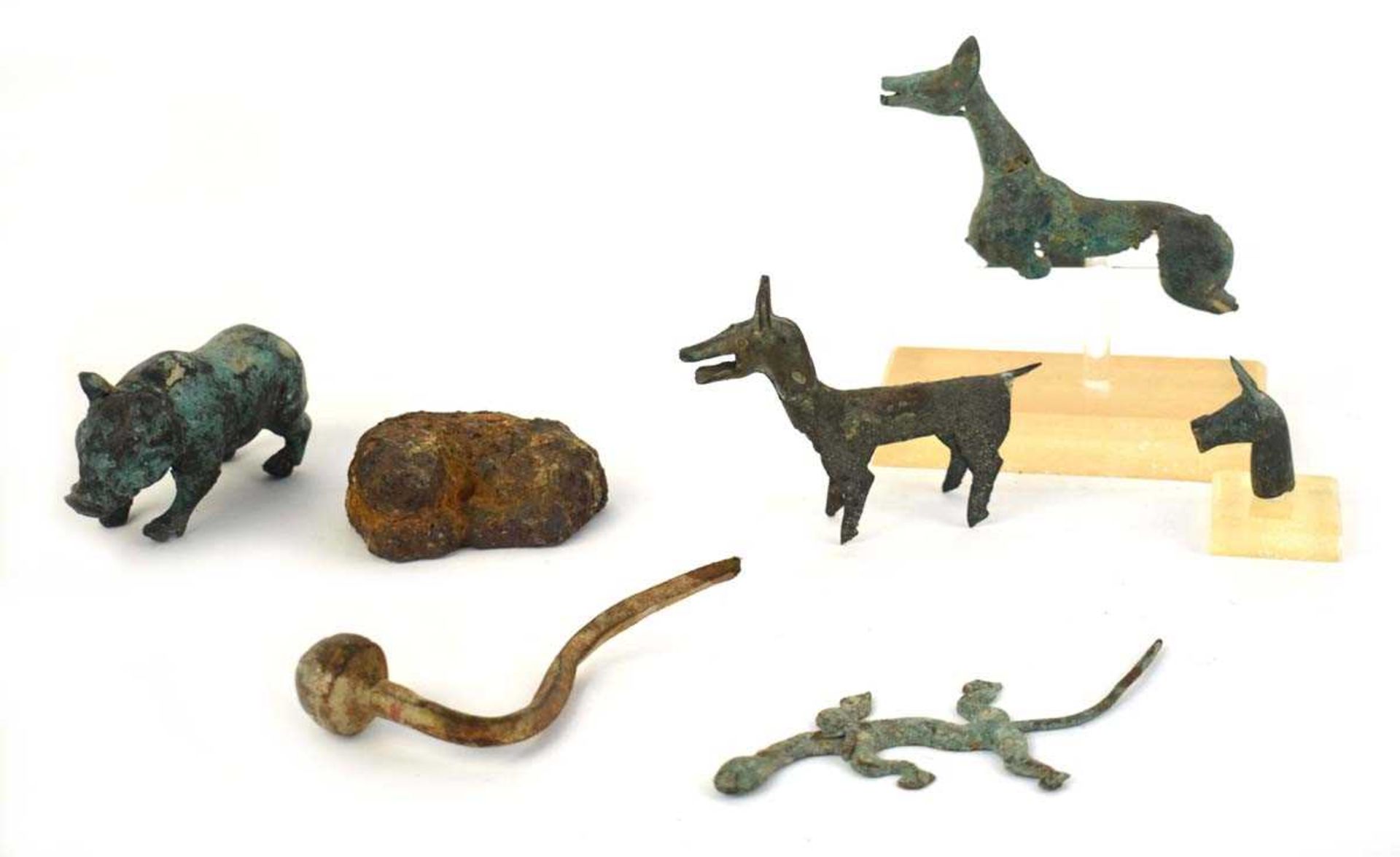 An archaic Chinese green patinated bronze figure modelled as a horse, h. 8 cm and a further group of