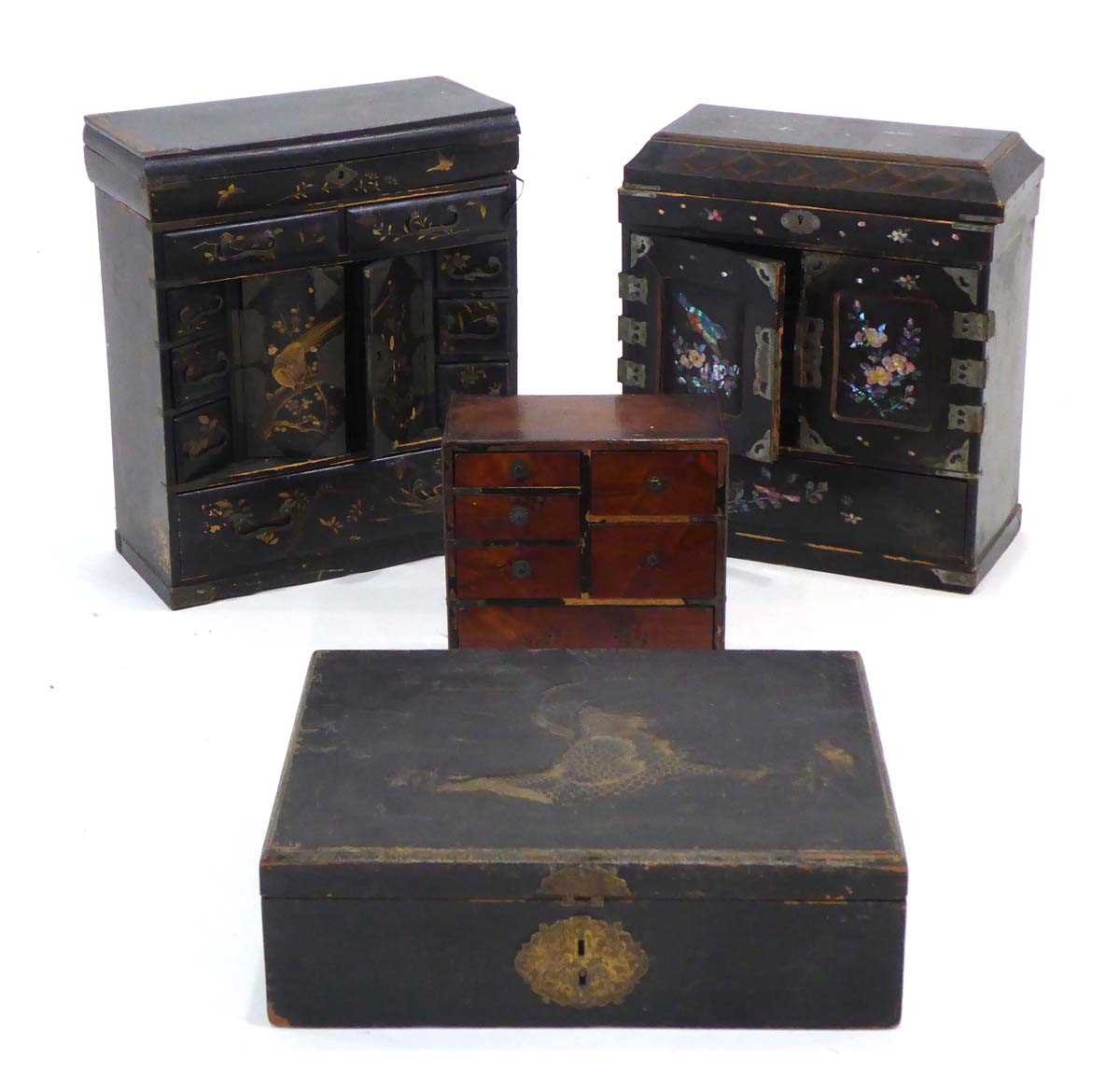 A group of Oriental and chinoiserie lacquered boxes including two table-top cabinets, a lift-lid box