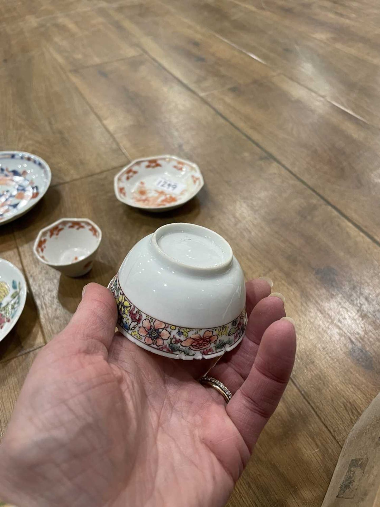 Twelve matching Chinese and other tea bowls, cups and saucers, each decorated in a different - Image 112 of 114