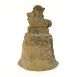 A Chinese archaic pottery bell shaped ornament modelled as a horse and rider, h. 42 cm *from the