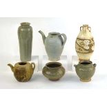 A Chinese celadon teapot of ovoid form, h. 16 cm and five further items of celadon and stoneware (6)