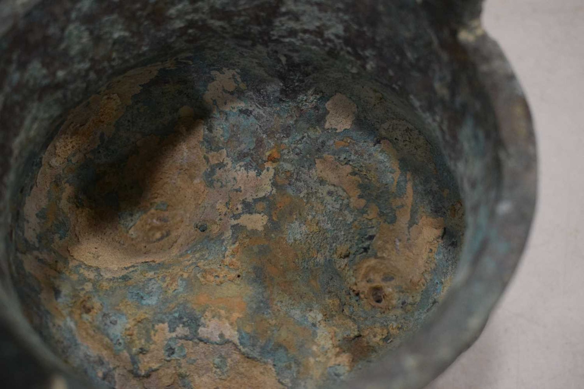 A Chinese green patinated bronze incense burner of archaic form, the triform base decorated with - Image 25 of 29