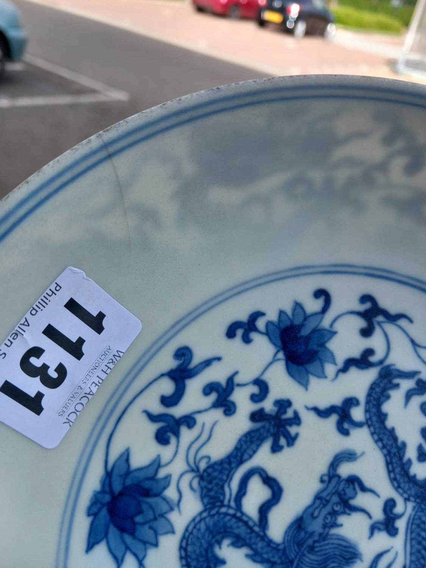 A Chinese blue and white shallow dish, centrally decorated with a dragon and lotus flowers, pseudo - Image 16 of 31