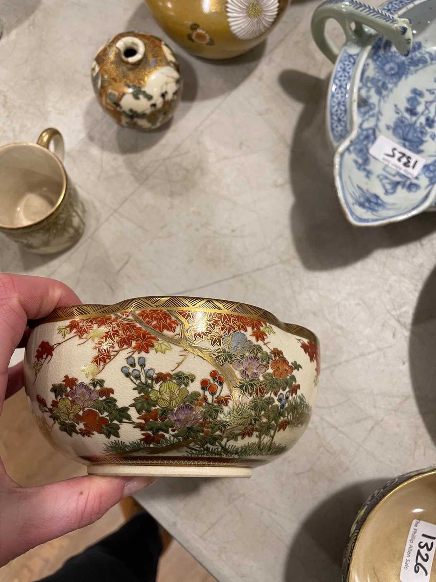 A Japanese satsuma bowl of flowerhead form, centrally decorated with peacocks within a landscape, - Image 31 of 41