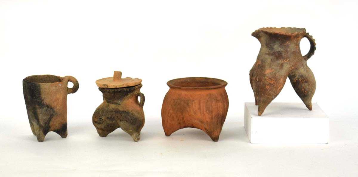 A Chinese archaic pottery jug of tripod form, h. 16 cm, together with three similar vessels (4) * - Image 2 of 28