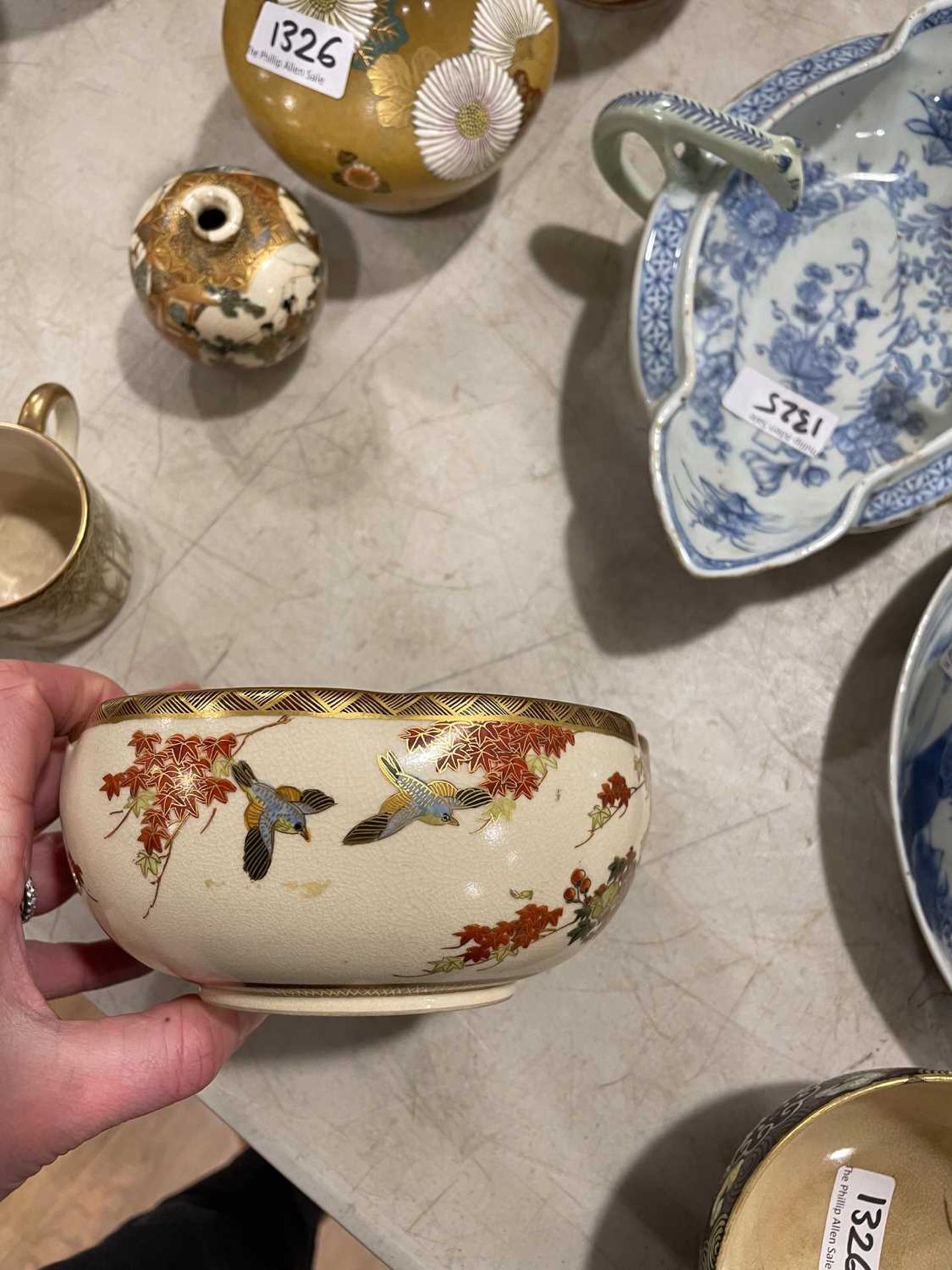 A Japanese satsuma bowl of flowerhead form, centrally decorated with peacocks within a landscape, - Image 34 of 41