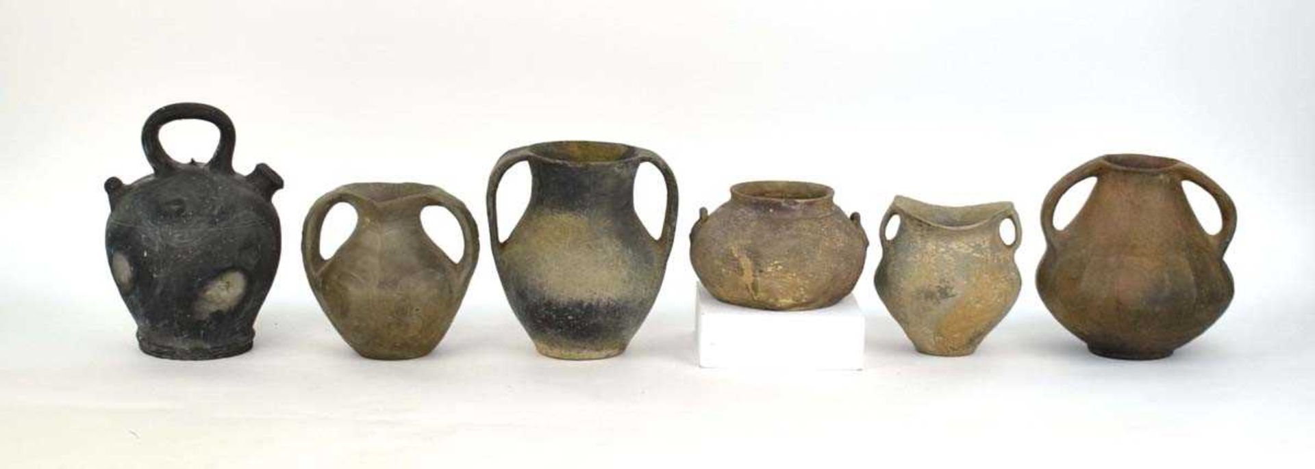 A Chinese archaic pottery two handled vase of squat form, h. 18 cm, together with five similar vases - Image 2 of 22