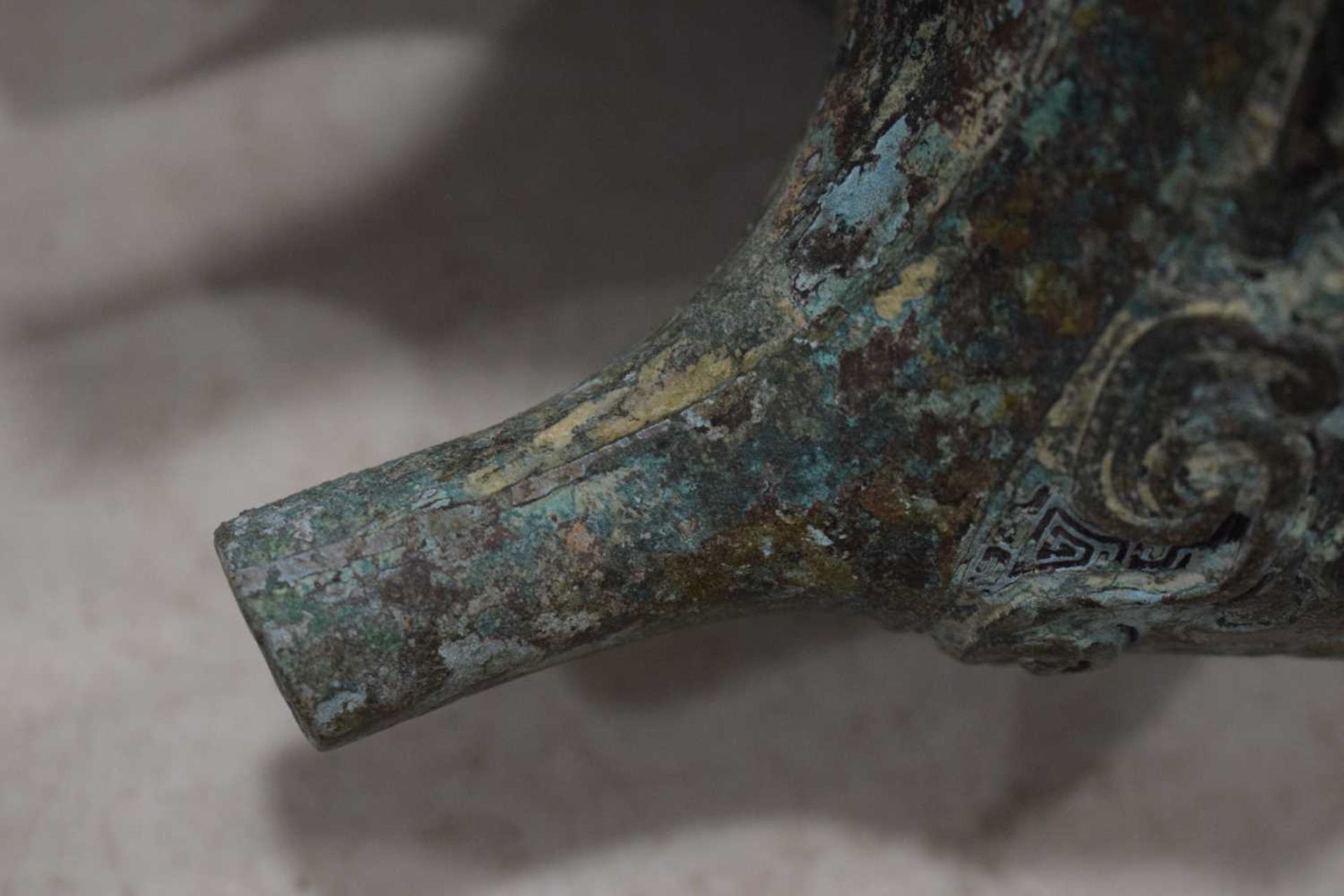A Chinese green patinated bronze incense burner of archaic form, the triform base decorated with - Image 16 of 29