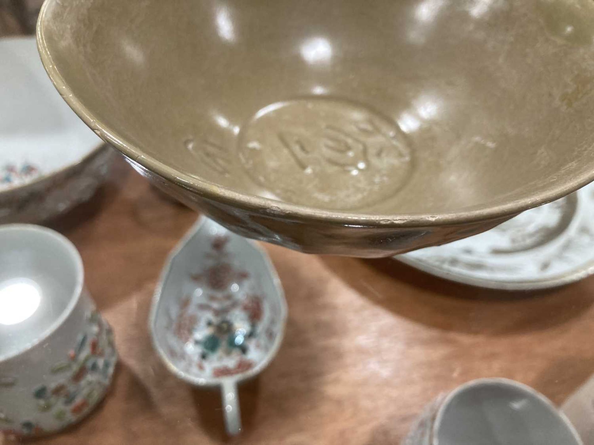 A Chinese celadon bowl of circular form repaired with the Kintsugi technique, d. 19.5 cm, h. 7.5 cm, - Image 14 of 21