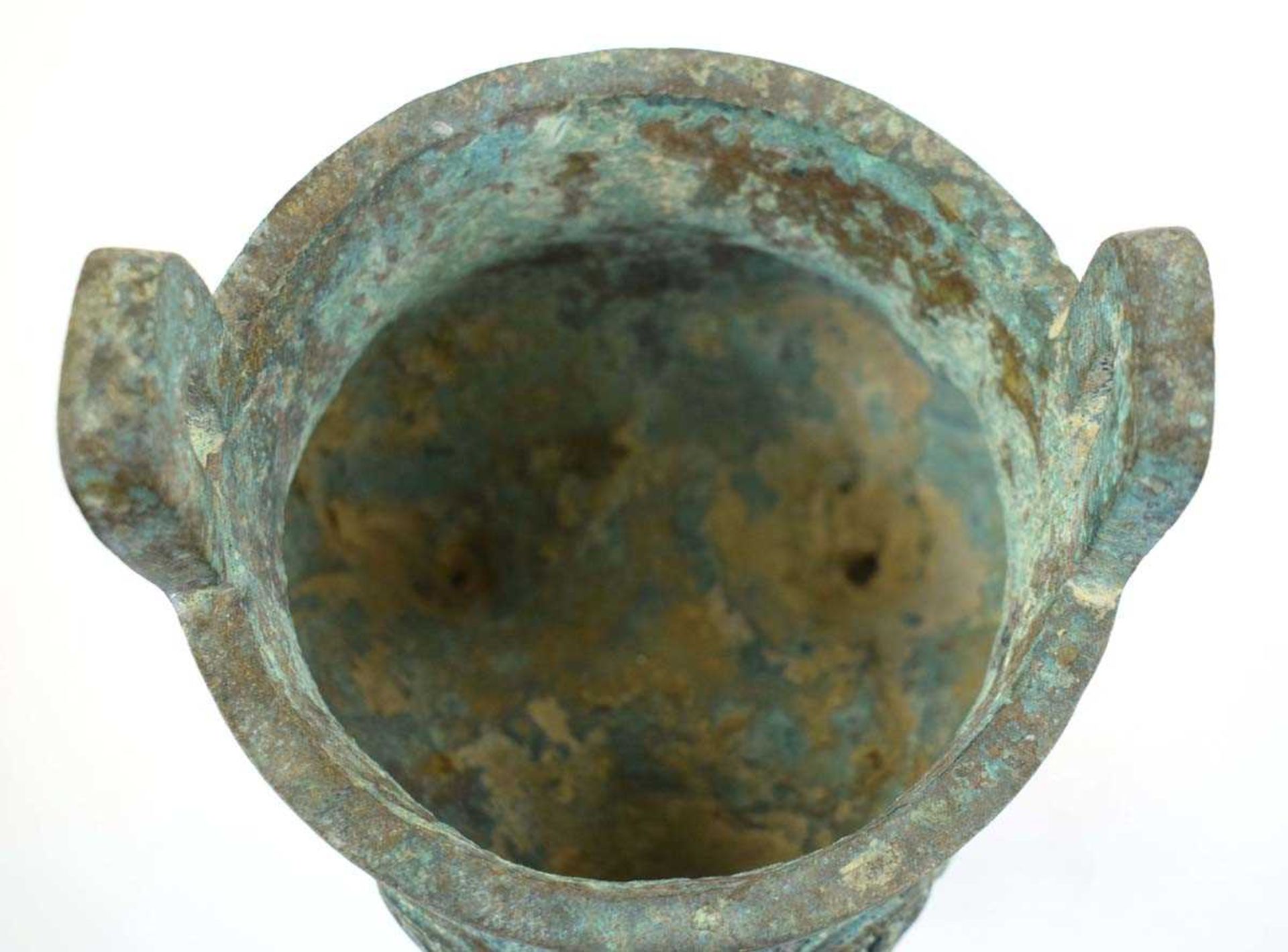 A Chinese green patinated bronze incense burner of archaic form, the triform base decorated with - Image 6 of 29