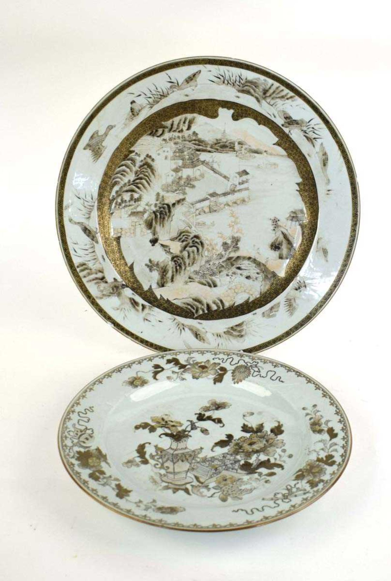A Chinese en-grisaille charger decorated with an extensive landscape, d. 39.5 cm, together with a