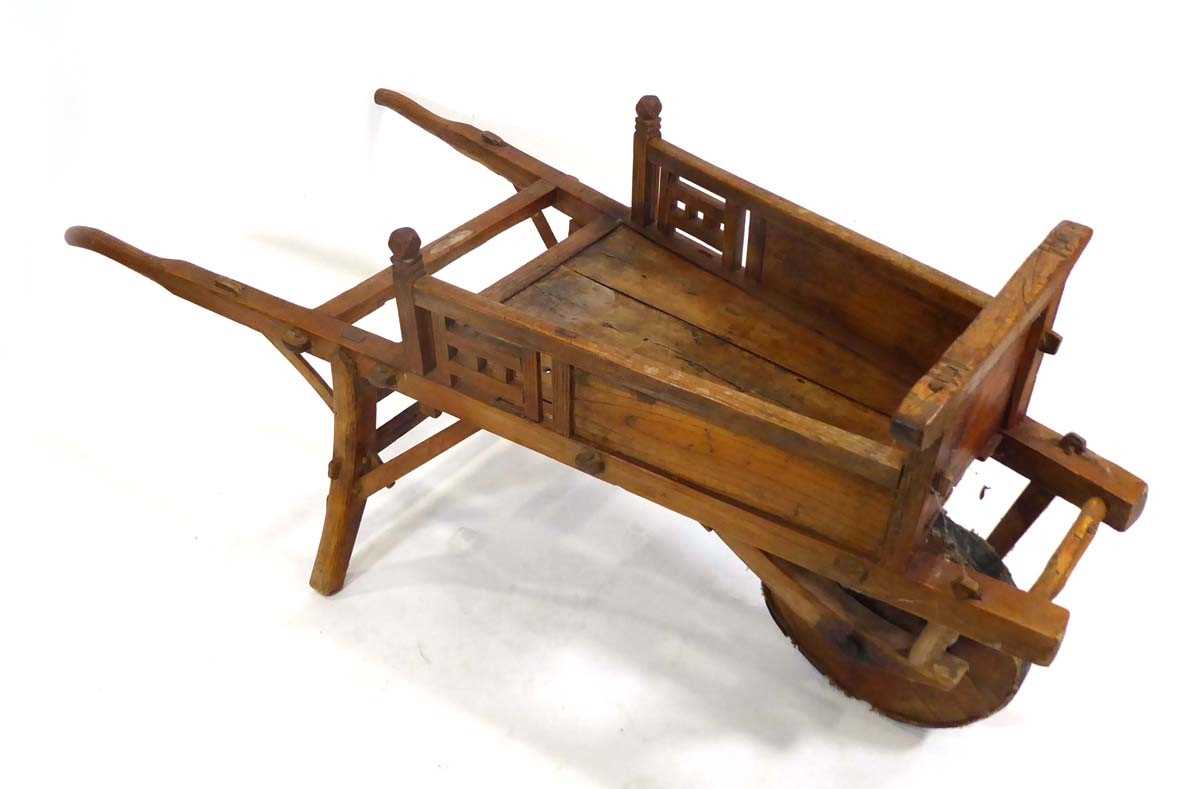 A Chinese elm wheelbarrow, l. 158 cm, w. 70 cm, h, 70.5 cm *from the collection of Phillip Allen ( - Image 2 of 2