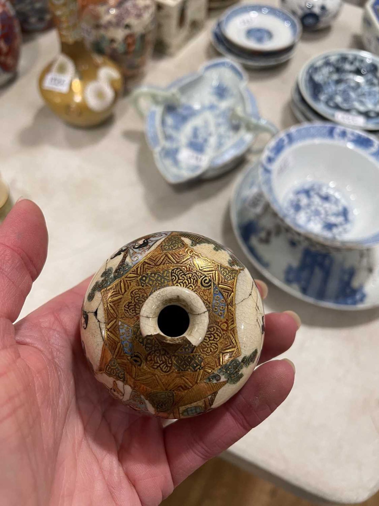 A Japanese satsuma bowl of flowerhead form, centrally decorated with peacocks within a landscape, - Image 14 of 41