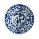 A 17th century Chinese blue and white bowl centrally decorated with a deer amongst a pine tree, d.