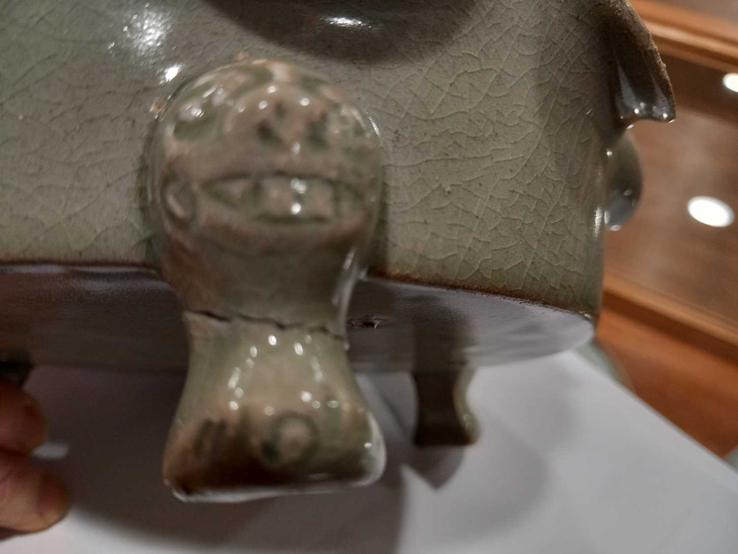 A Chinese celadon dish of scalloped circular form, relief decorated with exotic birds on three - Image 9 of 10