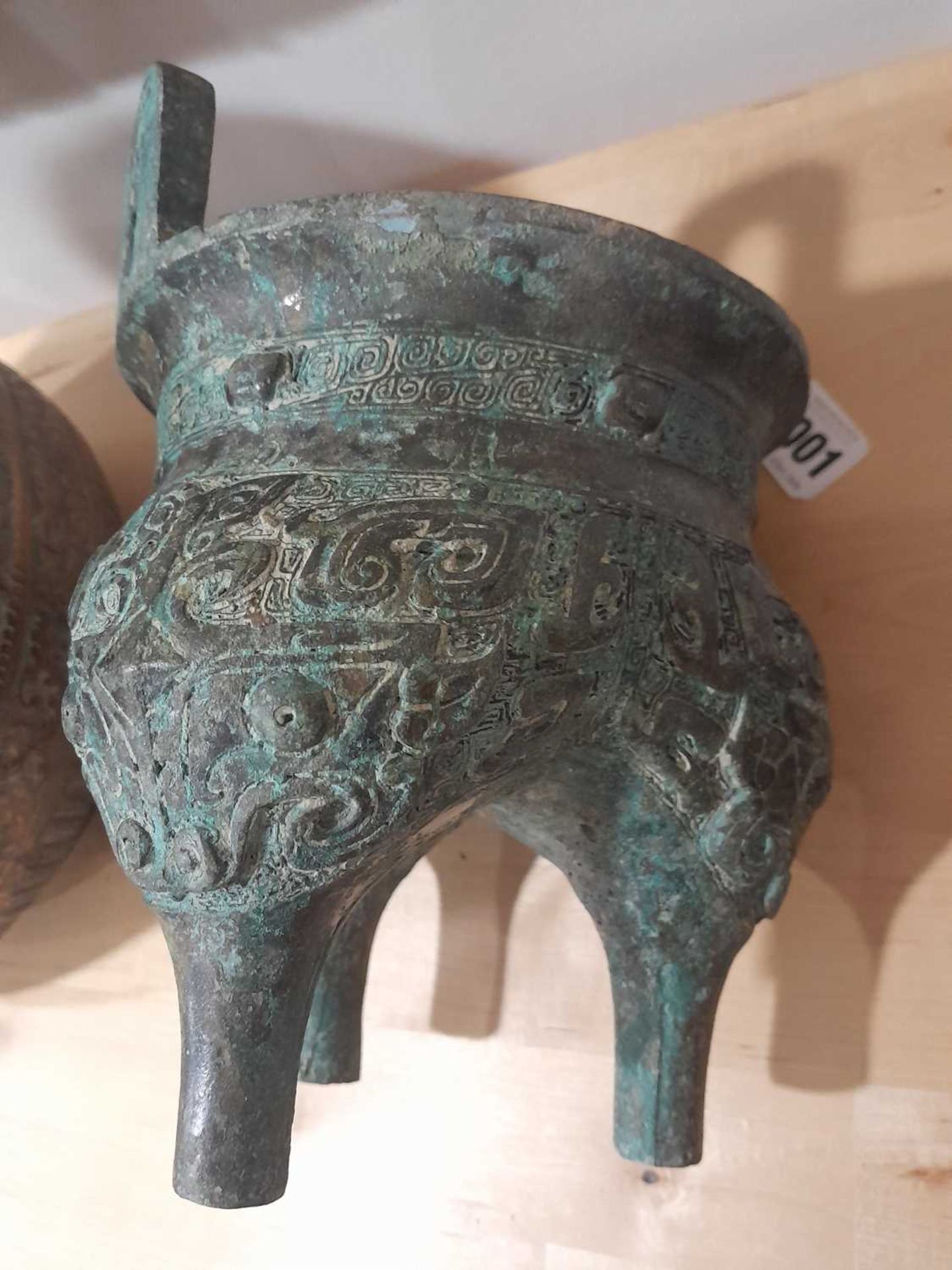 A Chinese green patinated bronze incense burner of archaic form, the triform base decorated with - Bild 13 aus 29